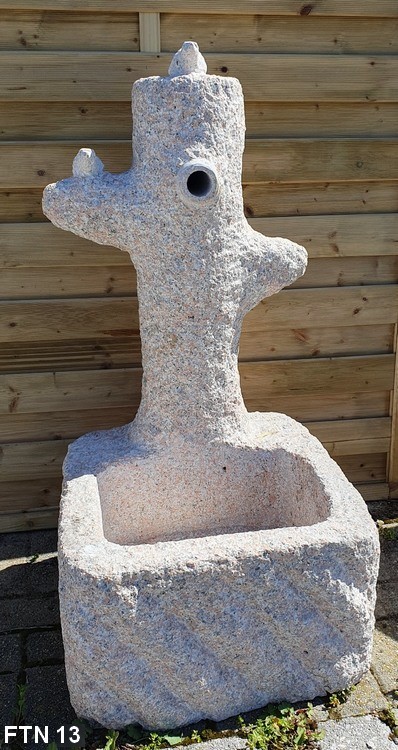 Fontana pietra finto tronco