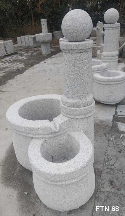fontana in pietra a due vasche